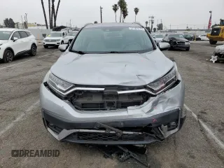 2020 Honda CR-V Touring z VIN 7FARW1H96LE006653, wystawiony jako Copart lot #57167475 z przebiegiem 49 286 mil mil oraz Szkoda całkowita • Salvage title. Historia ofert i sprzedaży dostępna na DreamBid. Obrazek 5.