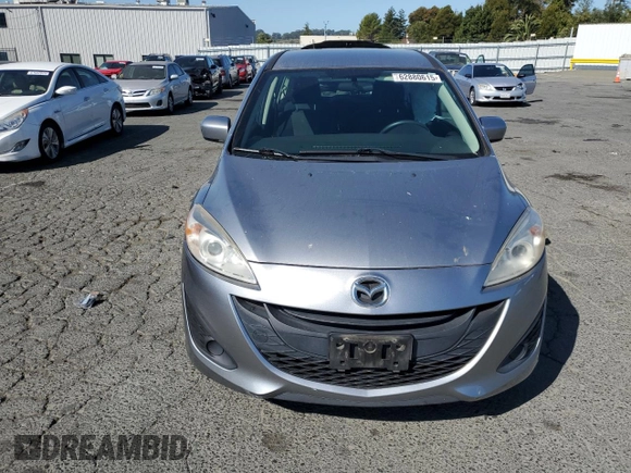 2012 Mazda 5 Sport with VIN JM1CW2BL4C0107068, listed as a Copart auction lot 62880615 with 142,610 mi miles and Salvage title. Bid and sale history available at DreamBid. Image 5.