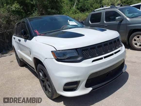2015 Jeep Grand Cherokee Summit с VIN 1C4RJFJTXFC173287, выставлен на аукционе IAAI как лот 42794100 с пробегом 125 705 миль миль и . История ставок и продаж доступна на DreamBid. Изображение 1.