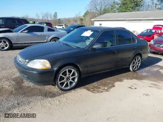 1997 Honda Civic LX with VIN 2HGEJ6670VH567081, listed as a IAAI auction lot 41995007 with 107,943 mi miles. Bid and sale history available at carsss.com. Image 2.