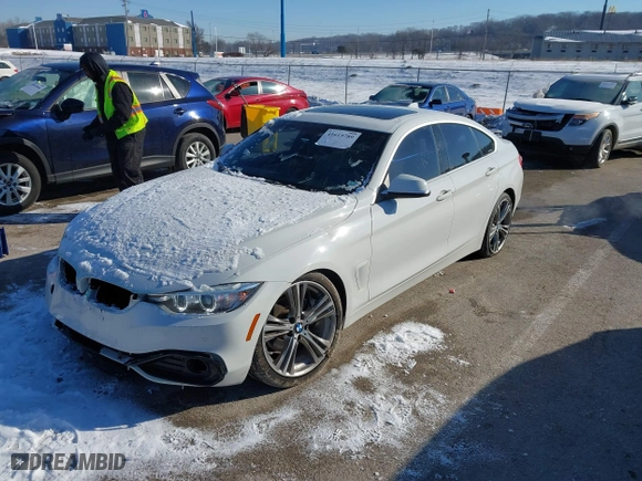 2016 BMW 4 Series 428i with VIN WBA4A9C50GG696366, listed as a IAAI auction lot 41615789 with 103,763 mi miles. Bid and sale history available at carsss.com. Image 18.