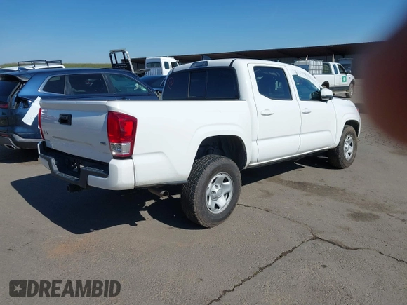 2021 Toyota Tacoma SR z VIN 3TMCZ5AN5MM417384, wystawiony jako IAAI lot #41617168 z przebiegiem 55 969 mil mil oraz . Historia ofert i sprzedaży dostępna na DreamBid. Obrazek 4.
