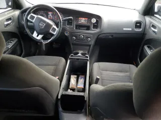 2012 Dodge Charger Police with VIN 2C3CDXAT2CH145211, listed as a Copart auction lot 87864395 with 149,785 mi miles and Salvage Title. Bid and sale history available at carsss.com. Image 8.