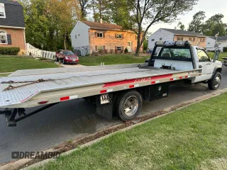 2000 GMC Sierra 1500 with VIN 1GDKC34F9YF421333, listed as a Copart auction lot 57167145 with 120,490 mi miles and Clean Title. Bid and sale history available at DreamBid. Image 6.