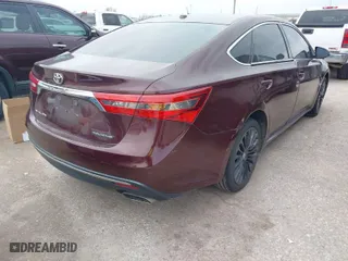 2016 Toyota Avalon Limited with VIN 4T1BK1EBXGU210512, listed as a IAAI auction lot 41268660 with 98,204 mi miles. Bid and sale history available at carsss.com. Image 4.