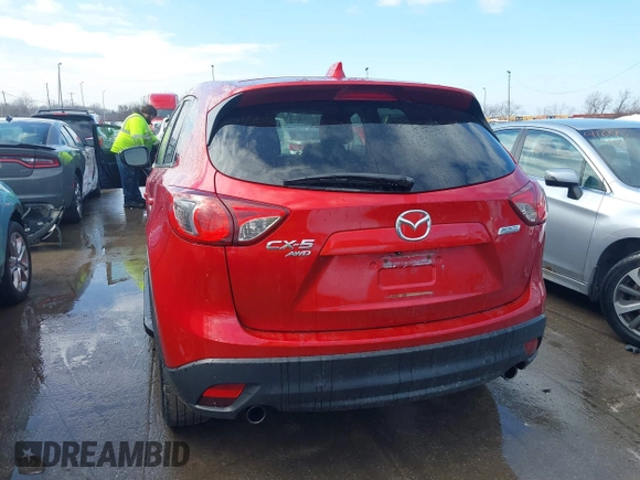 2015 Mazda CX-5 Grand Touring with VIN JM3KE4DY7F0477770, listed as a IAAI auction lot 41617849 with 106,135 mi miles. Bid and sale history available at carsss.com. Image 17.