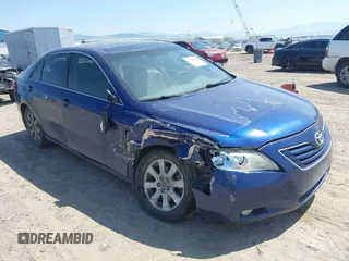 2007 Toyota Camry LE z VIN JTNBK46K373017446, wystawiony jako IAAI lot #42178299 z przebiegiem 243 481 mil mil oraz . Historia ofert i sprzedaży dostępna na DreamBid. Obrazek 1.