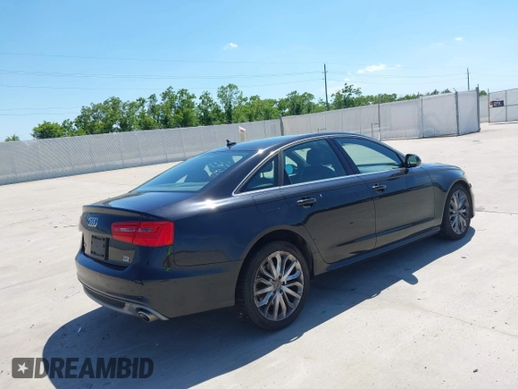 2014 Audi A6 Prestige with VIN WAUHMAFC8EN081609, listed as a IAAI auction lot 42252900 with 170,222 mi miles and . Bid and sale history available at DreamBid. Image 4.