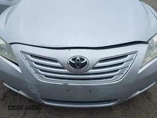 2007 Toyota Camry CE with VIN 4T1BE46K77U101223, listed as a IAAI auction lot 42282044 with 153,807 mi miles and . Bid and sale history available at DreamBid. Image 6.