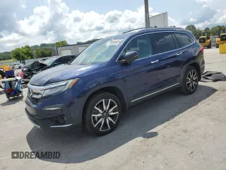 2022 Honda Pilot Touring 7-Passenger with VIN 5FNYF5H64NB017528, listed as a Copart auction lot 65406285 with 64,652 mi miles and Salvage title. Bid and sale history available at DreamBid. Image 1.