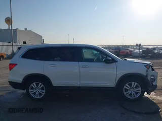 2016 Honda Pilot LX with VIN 5FNYF5H13GB016698, listed as a IAAI auction lot 41685173 with 188,001 mi miles and . Bid and sale history available at DreamBid. Image 14.