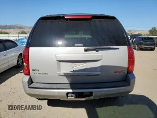 2007 GMC Yukon SLE z VIN 1GKFK13007J260249, wystawiony jako Copart lot #57646525 z przebiegiem 325 491 mil mil oraz Szkoda całkowita • Salvage title. Historia ofert i sprzedaży dostępna na DreamBid. Obrazek 6.