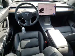 2022 Tesla Model Y Long Range with VIN 7SAYGAEE1NF381491, listed as a Copart auction lot 52694185 with 33,412 mi miles and Salvage Title. Bid and sale history available at DreamBid. Image 8.