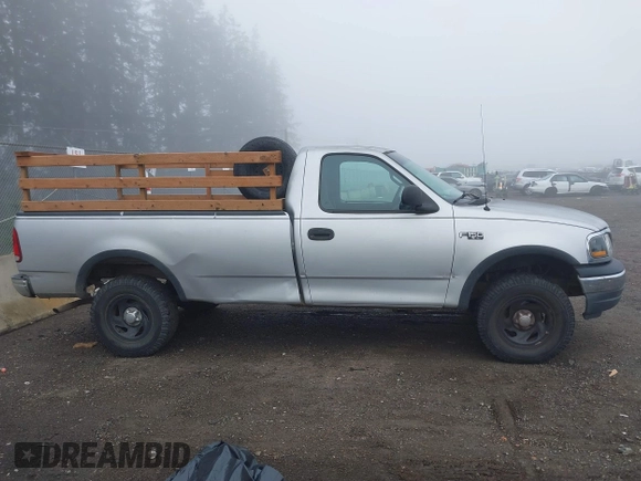 1999 Ford F-150 with VIN 2FTZF1828XCA85643, listed as a IAAI auction lot 41347113 with 173,813 mi miles and . Bid and sale history available at DreamBid. Image 13.