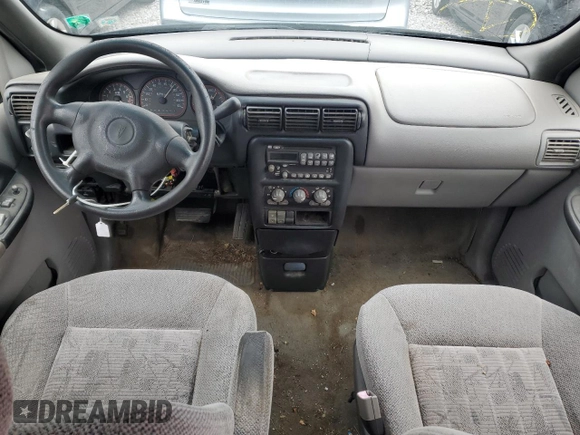 2004 Pontiac Montana z VIN 1GMDU03E94D196852, wystawiony jako Copart lot #57477115 z przebiegiem Nie podano mil oraz Nie do naprawy • Non repairable. Historia ofert i sprzedaży dostępna na DreamBid. Obrazek 8.