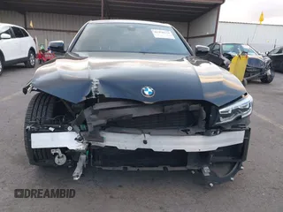 2021 BMW 3 Series 330i with VIN 3MW5R1J07M8B47179, listed as a IAAI auction lot 41450153 with 66,689 mi miles. Bid and sale history available at carsss.com. Image 13.