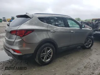 2017 Hyundai Santa Fe 2.4L z VIN 5NMZU3LB8HH032409, wystawiony jako Copart lot #57939915 z przebiegiem 105 494 mil mil oraz Szkoda całkowita • Salvage title. Historia ofert i sprzedaży dostępna na DreamBid. Obrazek 3.