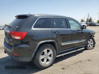 2011 Jeep Grand Cherokee Laredo with VIN 1J4RR4GG0BC563603, listed as a Copart auction lot 60237475 with 243,885 mi miles and Salvage title. Bid and sale history available at DreamBid. Image 3.