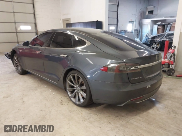 2014 Tesla Model S 60 with VIN 5YJSA1H13EFP49912, listed as a IAAI auction lot 41716661 with 129,776 mi miles and . Bid and sale history available at DreamBid. Image 3.
