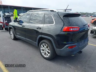 2014 Jeep Cherokee Latitude with VIN 1C4PJLCB0EW288309, listed as a IAAI auction lot 41624746 with 164,037 mi miles and . Bid and sale history available at DreamBid. Image 3.