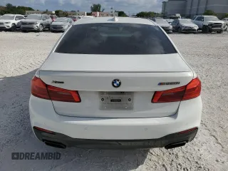 2019 BMW 5 Series M550i xDrive with VIN WBAJB9C56KB288170, listed as a Copart auction lot 54415635 with Not provided miles and Non repairable. Bid and sale history available at DreamBid. Image 6.