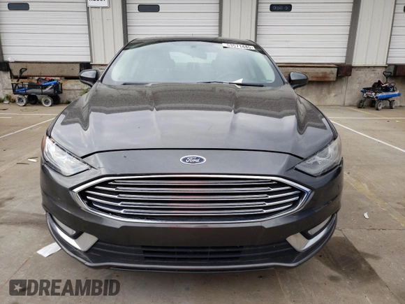 2018 Ford Fusion SE z VIN 3FA6P0HD8JR245391, wystawiony jako Copart lot #53571445 z przebiegiem 158 138 mil mil oraz Czysty tytuł • Clean title. Historia ofert i sprzedaży dostępna na DreamBid. Obrazek 5.