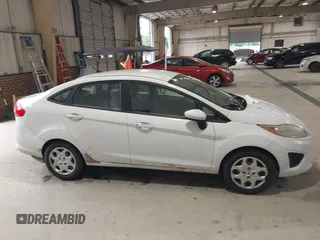 2011 Ford Fiesta S with VIN 3FADP4AJ8BM170415, listed as a IAAI auction lot 42365822 with 150,603 mi miles and . Bid and sale history available at DreamBid. Image 12.