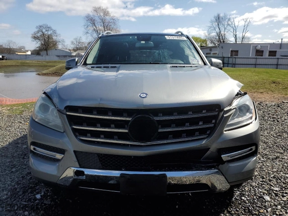 2012 Mercedes-Benz M-Class ML 350 with VIN 4JGDA5HB2CA001713, listed as a Copart auction lot 51315685 with 153,835 mi miles and Salvage Title. Bid and sale history available at carsss.com. Image 5.