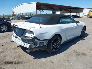 2021 Ford Mustang EcoBoost with VIN 1FATP8UH6M5103056, listed as a IAAI auction lot 41822722 with 71,820 mi miles. Bid and sale history available at carsss.com. Image 4.