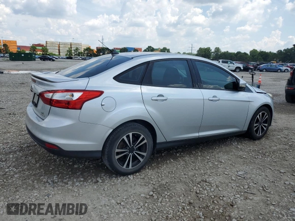 2013 Ford Focus SE with VIN 1FADP3F25DL106039, listed as a Copart auction lot 63492965 with 113,553 mi miles and Salvage title. Bid and sale history available at DreamBid. Image 3.