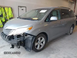 2015 Toyota Sienna LE AAS with VIN 5TDKK3DC2FS643769, listed as a IAAI auction lot 42473037 with 195,211 mi miles and . Bid and sale history available at DreamBid. Image 2.