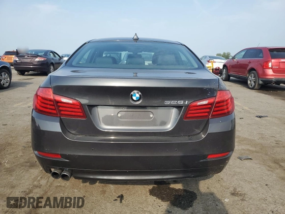 2014 BMW 5 Series 528i xDrive with VIN WBA5A7C55ED612212, listed as a Copart auction lot 60968555 with 196,653 mi miles and Salvage title. Bid and sale history available at DreamBid. Image 6.