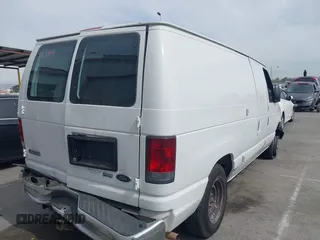 2009 Ford Econoline Cargo Commercial with VIN 1FTNE14W09DA38068, listed as a IAAI auction lot 41690071 with 182,337 mi miles and . Bid and sale history available at DreamBid. Image 4.