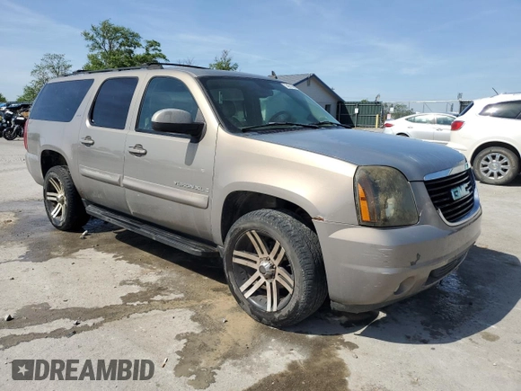 2007 GMC Yukon XL SLT z VIN 1GKFK16387J173009, wystawiony jako Copart lot #54010965 z przebiegiem 264 446 mil mil oraz Czysty tytuł • Clean title. Historia ofert i sprzedaży dostępna na DreamBid. Obrazek 4.