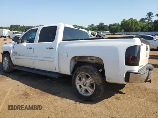 2013 Chevrolet Silverado 1500 LT with VIN 3GCPCSE07DG196708, listed as a Copart auction lot 53049085 with 94,699 mi miles and Salvage Title. Bid and sale history available at DreamBid. Image 2.