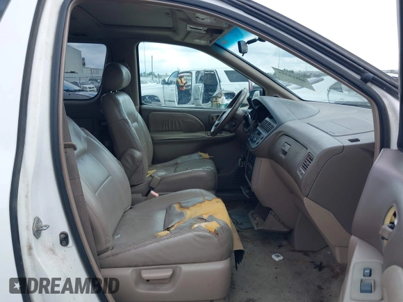 1999 Toyota Sienna LE with VIN 4T3ZF13C1XU152733, listed as a IAAI auction lot 40819395 with 184,540 mi miles. Bid and sale history available at carsss.com. Image 5.