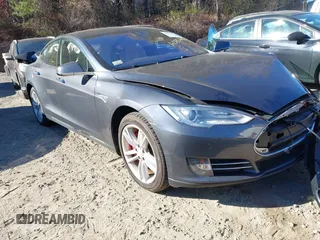 2014 Tesla Model S P85D with VIN 5YJSA1H23EFP62992, listed as a IAAI auction lot 40857026 with 107,184 mi miles and . Bid and sale history available at DreamBid. Image 1.