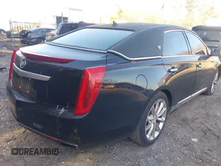 2013 Cadillac XTS Premium z VIN 2G61S5S38D9199459, wystawiony jako IAAI lot #41787638 z przebiegiem 171 298 mil mil oraz . Historia ofert i sprzedaży dostępna na DreamBid. Obrazek 4.