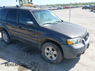 2007 Ford Escape XLT with VIN 1FMYU03167KA10635, listed as a IAAI auction lot 42009859 with 1 mi miles. Bid and sale history available at carsss.com. Image 1.