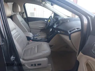 2015 Ford Escape Titanium with VIN 1FMCU0J92FUA20469, listed as a IAAI auction lot 42510293 with 161,466 mi miles and . Bid and sale history available at DreamBid. Image 5.