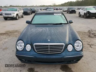 2000 Mercedes-Benz E-Class with VIN WDBJF65J1YB103093, listed as a Copart auction lot 51587325 with 208,350 mi miles and Salvage Title. Bid and sale history available at carsss.com. Image 5.