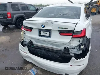 2021 BMW 3 Series M340i with VIN 3MW5U7J01M8B74069, listed as a IAAI auction lot 41879940 with 61,721 mi miles. Bid and sale history available at carsss.com. Image 6.