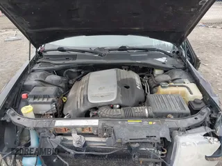2006 Chrysler 300 C with VIN 2C3KA63H06H189591, listed as a IAAI auction lot 41810691 with 184,465 mi miles. Bid and sale history available at carsss.com. Image 10.