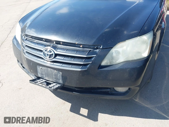 2006 Toyota Avalon XL with VIN 4T1BK36B26U135605, listed as a IAAI auction lot 41619710 with 331,815 mi miles. Bid and sale history available at carsss.com. Image 6.