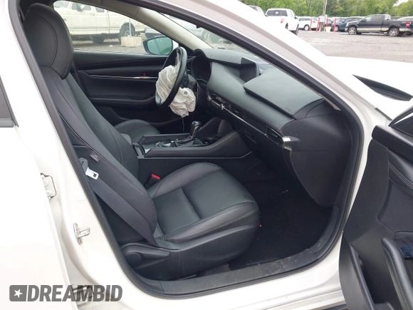 2021 Mazda 3 Preferred z VIN 3MZBPBCL0MM250862, wystawiony jako IAAI lot #42318612 z przebiegiem 86 056 mil mil oraz . Historia ofert i sprzedaży dostępna na DreamBid. Obrazek 5.