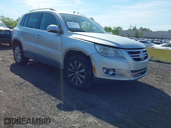 2011 Volkswagen Tiguan SE with VIN WVGBV7AX4BW528845, listed as a IAAI auction lot 42248245 with 224,808 mi miles and . Bid and sale history available at DreamBid. Image 1.