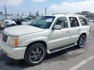 2003 Cadillac Escalade z VIN 1GYEK63N93R319255, wystawiony jako IAAI lot #42371706 z przebiegiem 171 656 mil mil oraz . Historia ofert i sprzedaży dostępna na DreamBid. Obrazek 2.