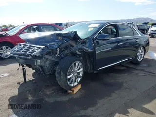 2013 Cadillac XTS Luxury with VIN 2G61P5S31D9182553, listed as a IAAI auction lot 42076227 with 116,849 mi miles and . Bid and sale history available at DreamBid. Image 18.