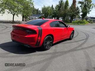 2020 Dodge Charger SXT z VIN 2C3CDXBG1LH121810, wystawiony jako Copart lot #62026425 z przebiegiem 66 439 mil mil oraz Czysty tytuł • Clean title. Historia ofert i sprzedaży dostępna na DreamBid. Obrazek 4.