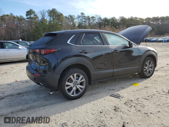 2021 Mazda CX-30 Select with VIN 3MVDMBBL1MM253743, listed as a Copart auction lot 48373625 with 59,466 mi miles and Salvage Title. Bid and sale history available at carsss.com. Image 3.